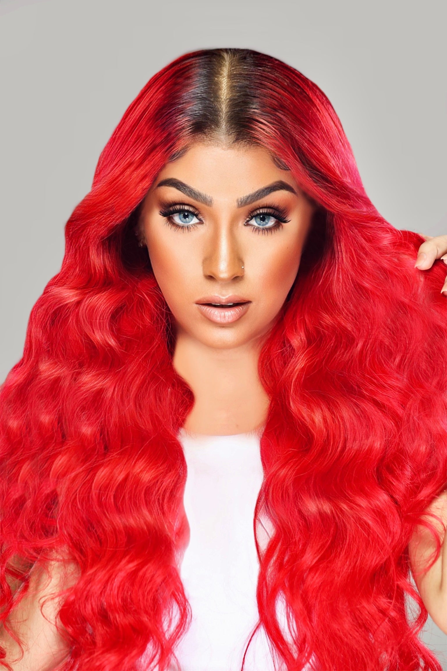 Woman wearing a vibrant red Remy human hair wig